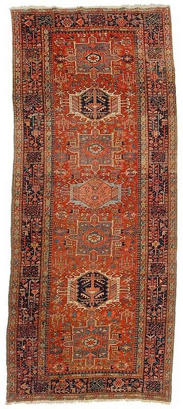 Appraisal: Karajeh Runner Persian th century seven faceted medallions within red