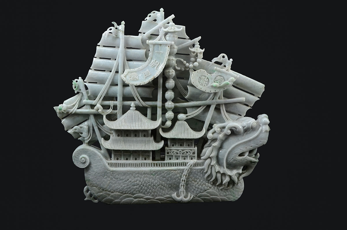 Appraisal: LARGE CHINESE CARVED JADEITE DRAGON BOAT Carved mottled apple green