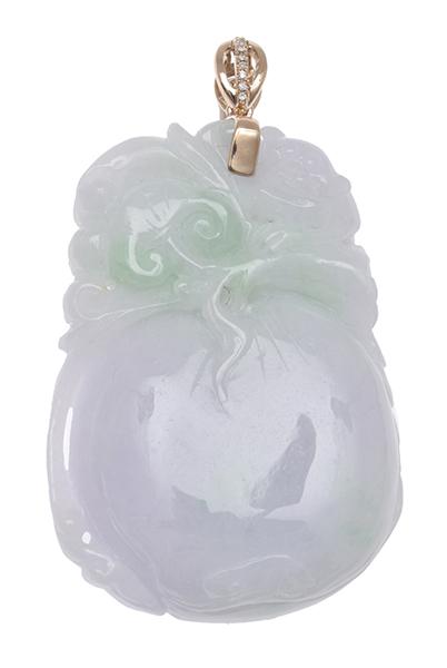 Appraisal: A JADEITE AND DIAMOND PENDANT The jade of light green