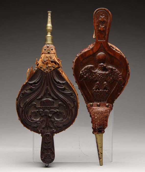 Appraisal: PAIR OF CARVED WOOD FIREPLACE BELLOWS One pair with carved