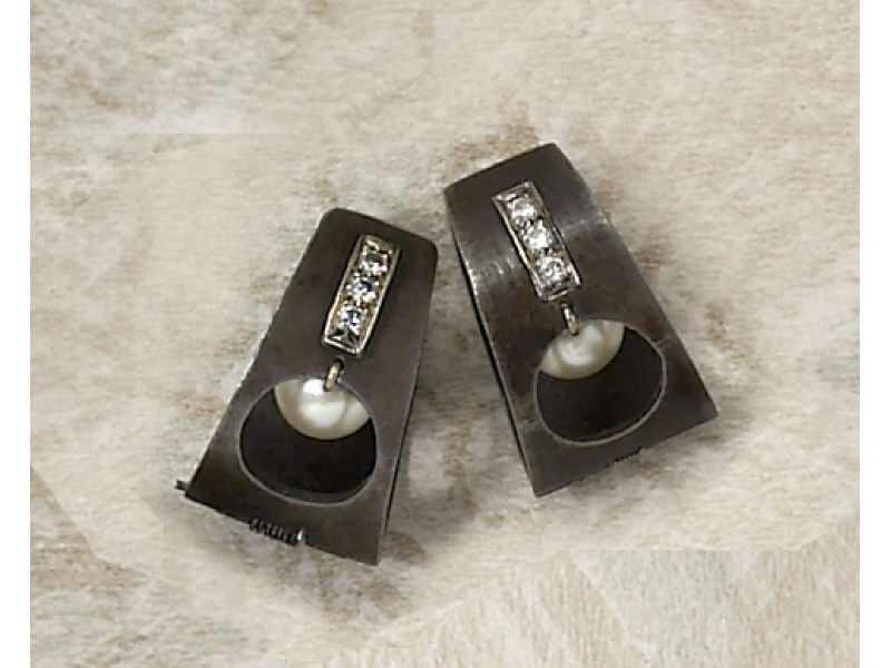 Appraisal: PEARL AND DIAMOND EARRINGS Black iron clip earrings with beaded