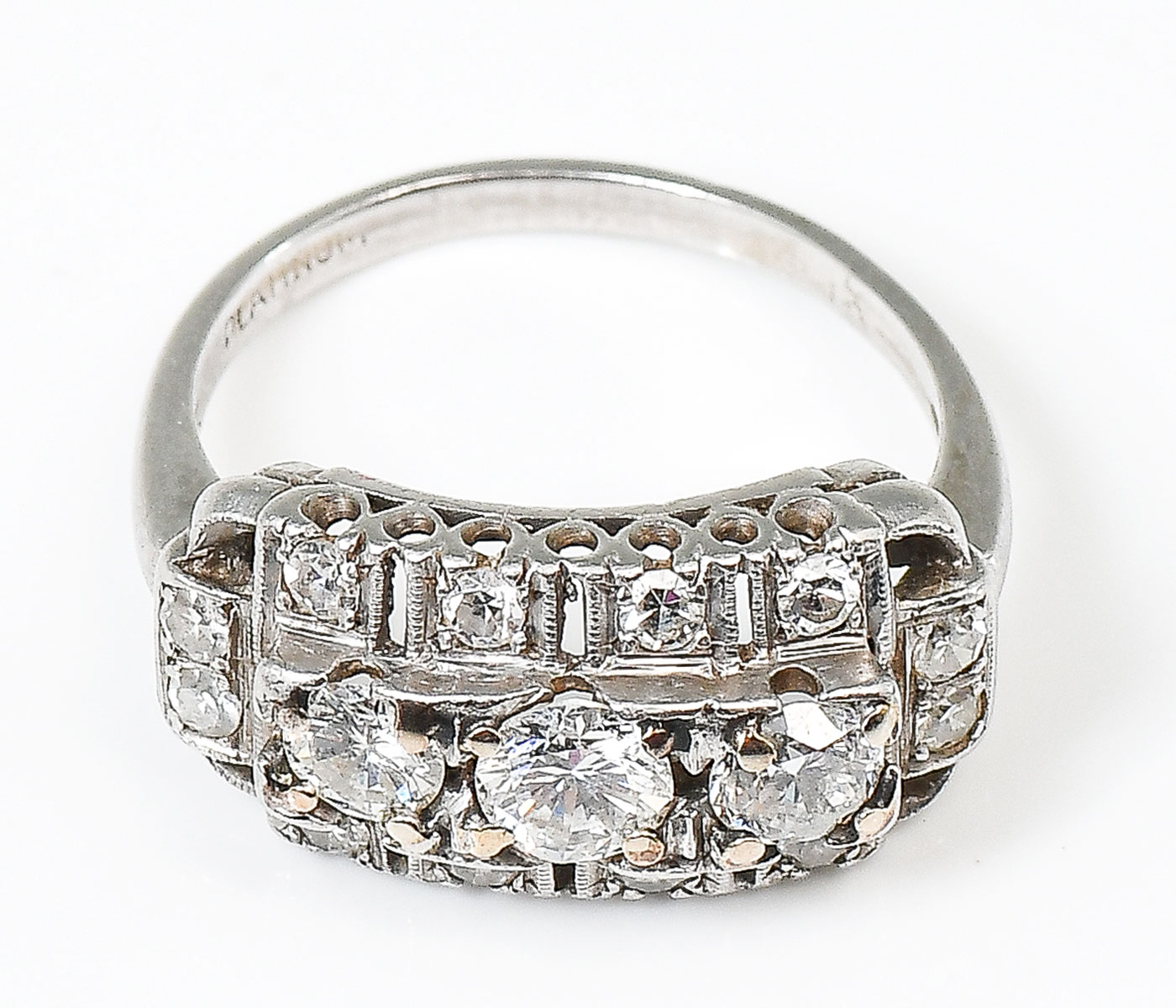 Appraisal: ART DECO ROW PLATINUM CTW DIAMOND RING round brilliant cut