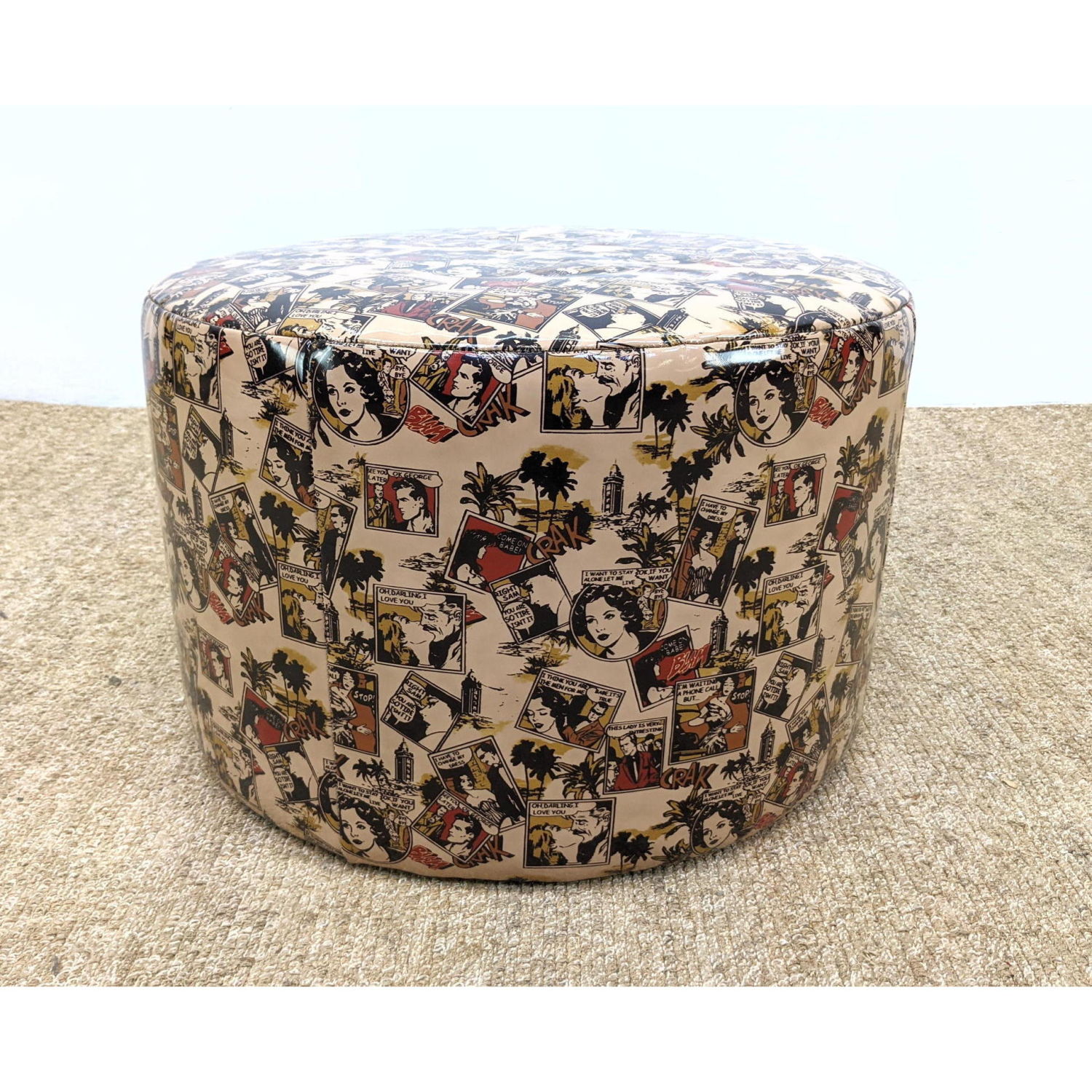 Appraisal: Comic Strip Modernist Vinyl Footstool Ottoman Tan background Dimensions H