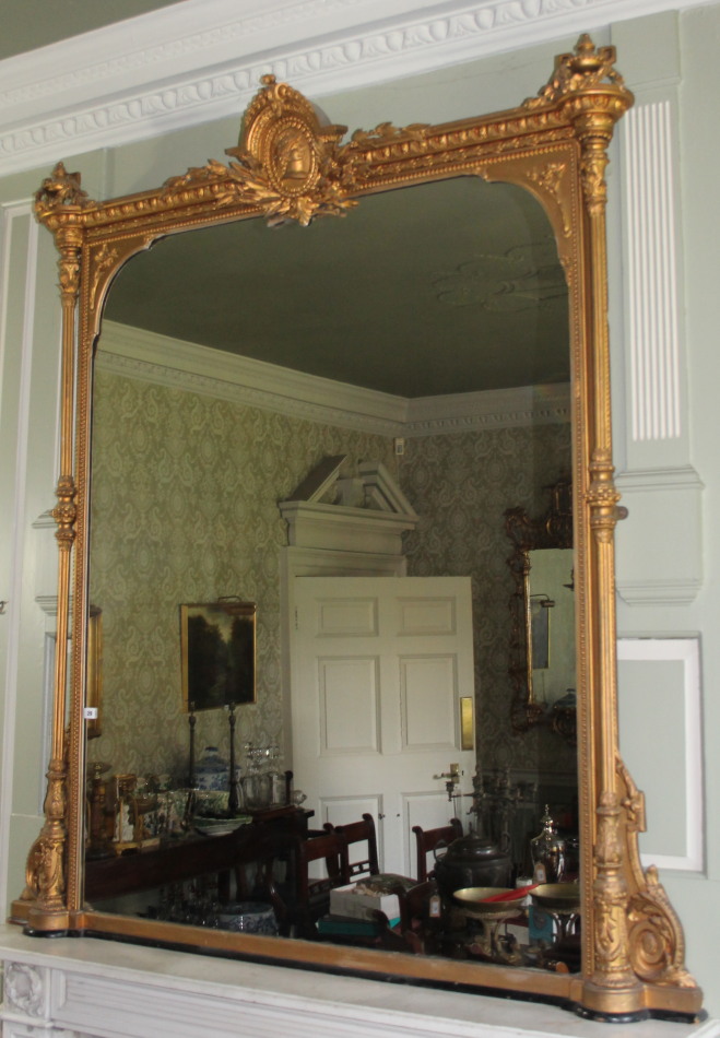 Appraisal: A thC gilt gesso overmantel mirror the crest decorated with