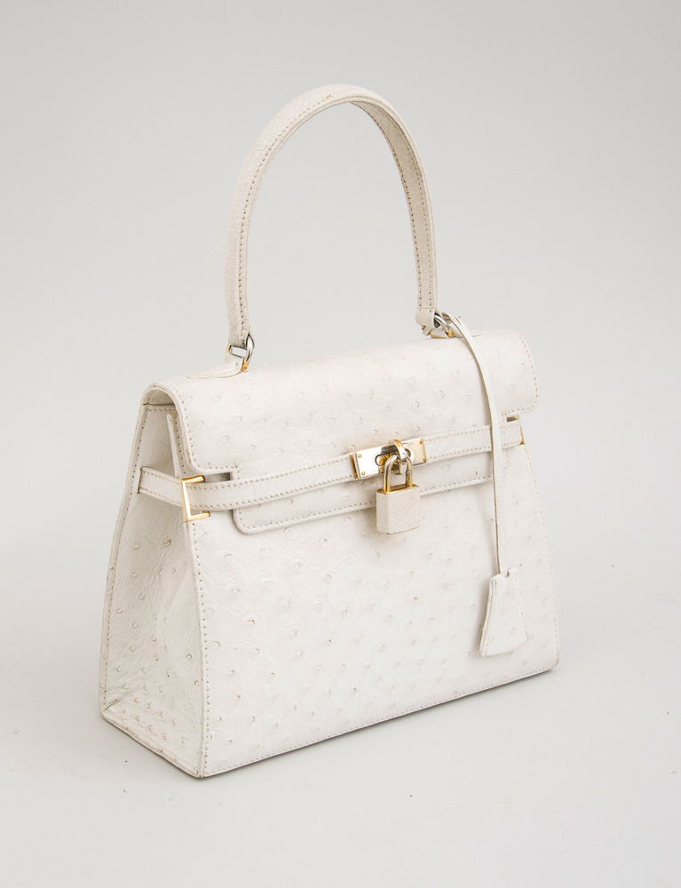 Appraisal: MORABITO SMALL OSTRICH PATTERNED WHITE LEATHER HANDBAG x in Estimate