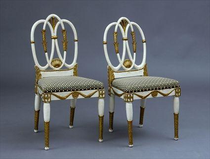 Appraisal: PAIR OF NEOCLASSICAL PAINTED AND PARCEL GILT SIDE CHAIRS The