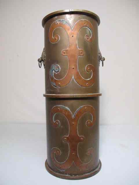 Appraisal: Arts and Crafts copper umbrella stand with brass embellishments Generally