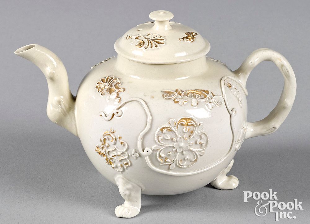 Appraisal: Staffordshire salt glaze stoneware teapot Staffordshire salt glaze stoneware ovoid