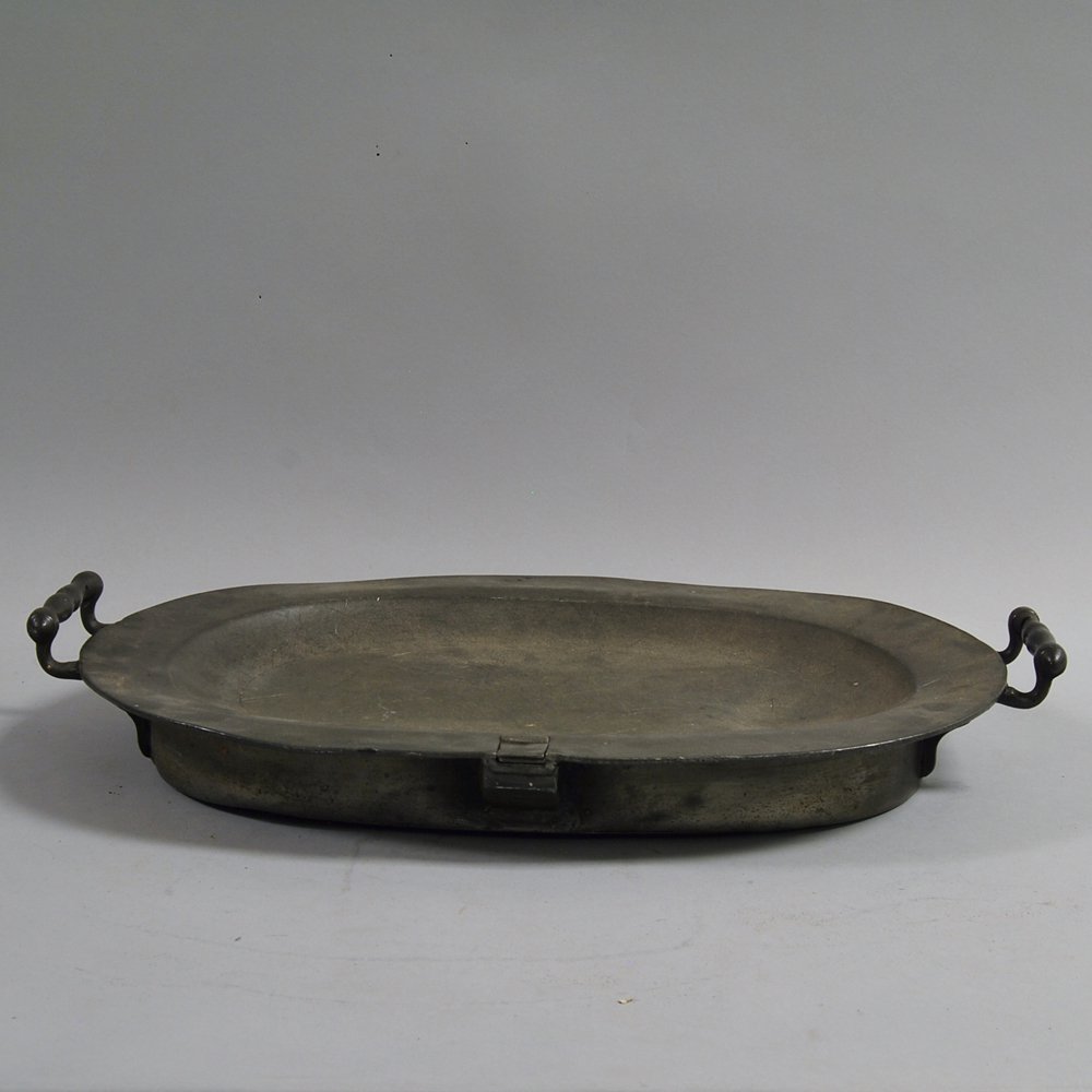 Appraisal: English Pewter Warming Platter London th century the ovoid platter