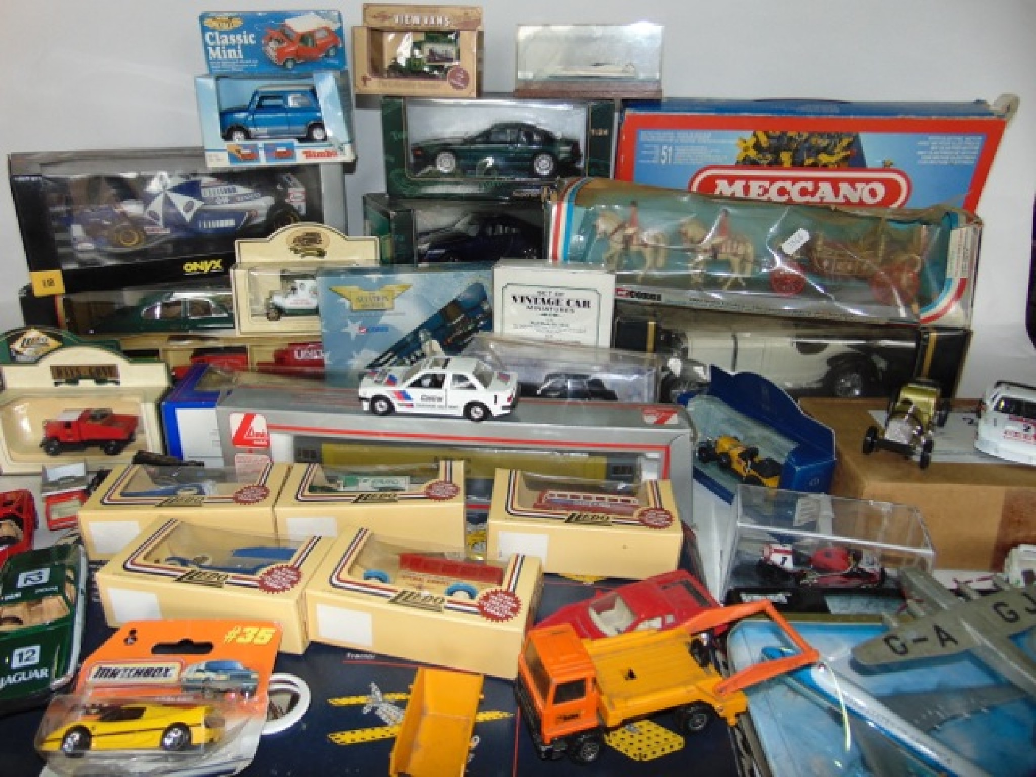 Appraisal: A quantity of boxed die cast model vehicles to include