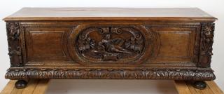 Appraisal: Antique French walnut trunk with relief carving French mid th