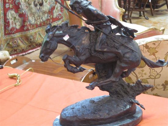 Appraisal: FREDRIC REMINGTON REPRODUCTION BRONZE Native American hunting on horseback On