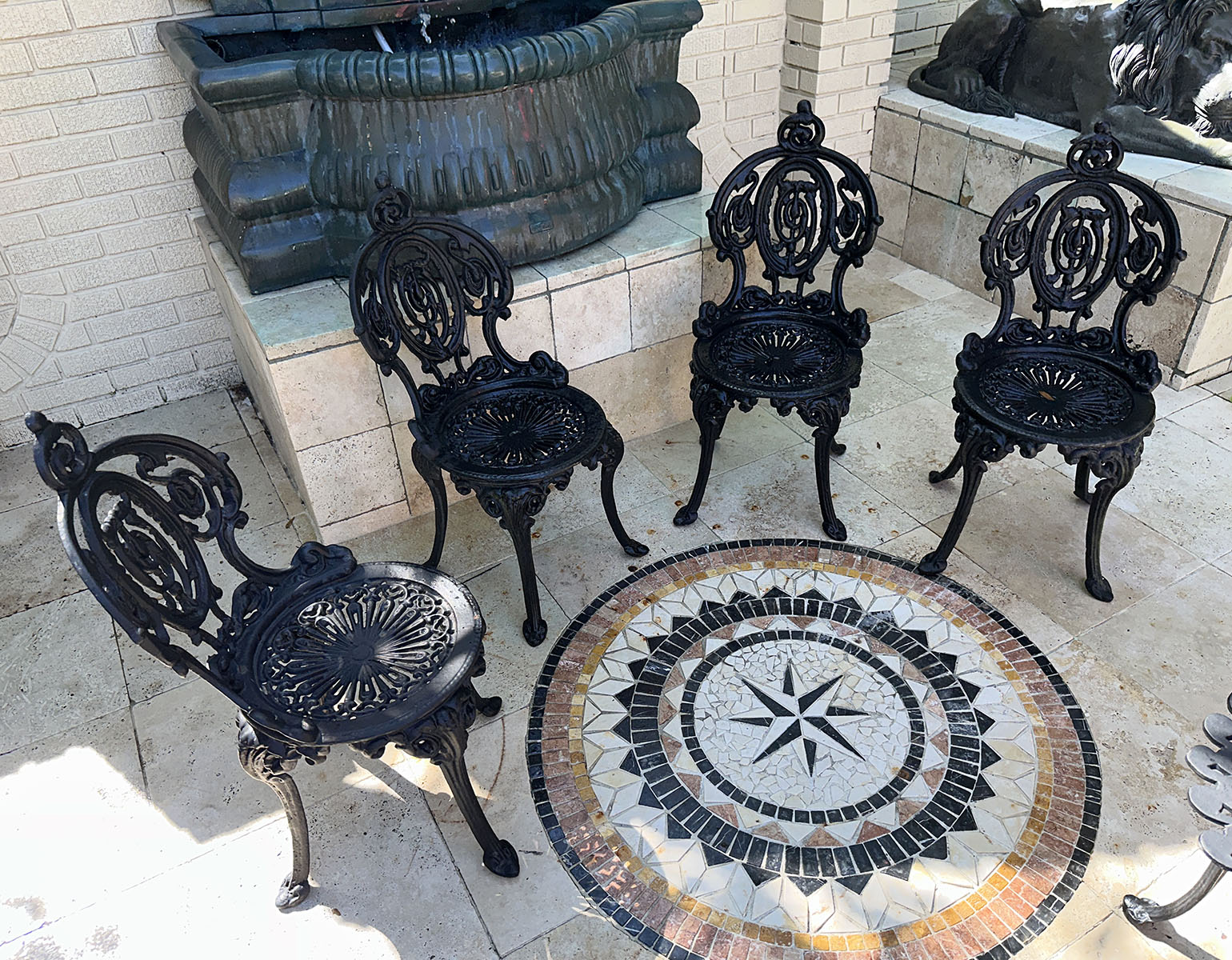 Appraisal: HEAVY FANCY CAST IRON GARDEN CHAIRS Black painted Cast Iron