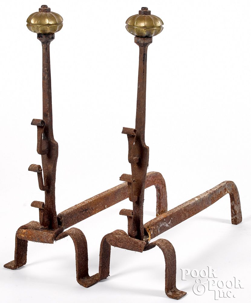 Appraisal: Pair of Continental wrought iron andirons th c Pair of