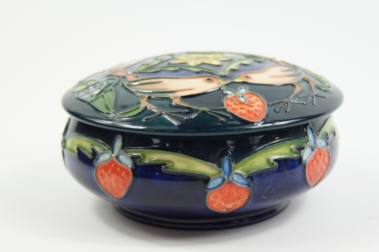 Appraisal: A Moorcroft Pottery powder box and cover decorated in The