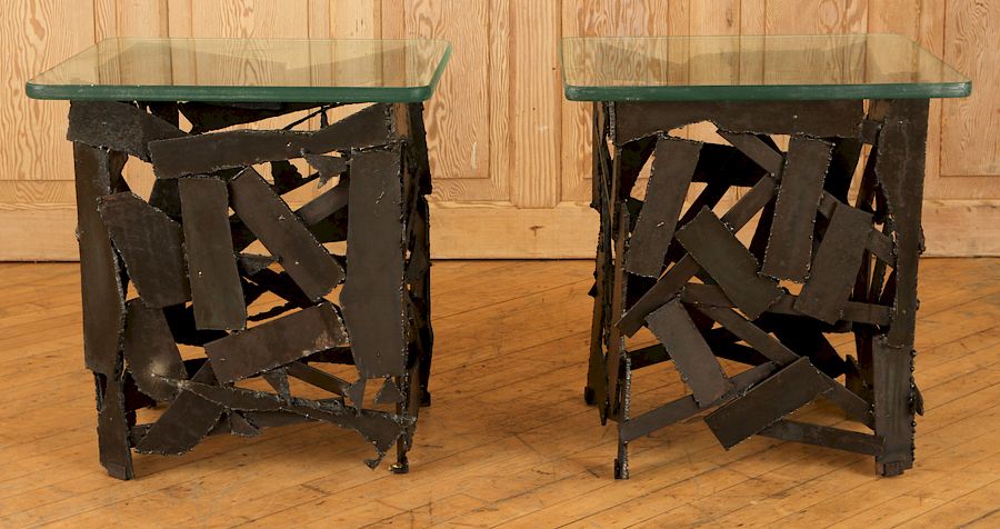 Appraisal: PAIR BRUTALIST STYLE IRON TABLES GLASS TOPS A pair of