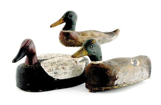 Appraisal: Very unusual factory canvas cork gunning decoys Herters Inc mallard