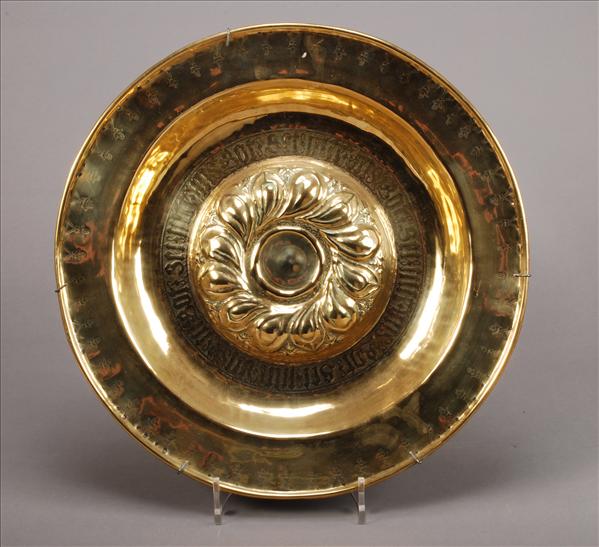 Appraisal: A Nuremberg brass alms dish late th century the raised