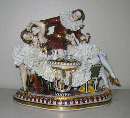 Appraisal: MEISSEN STYLE PORCELAIN FIGURE GROUP Depicting three figures two ballerinas