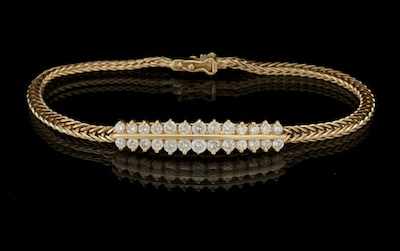 Appraisal: A Ladies' Diamond Bracelet k yellow gold bracelet set to