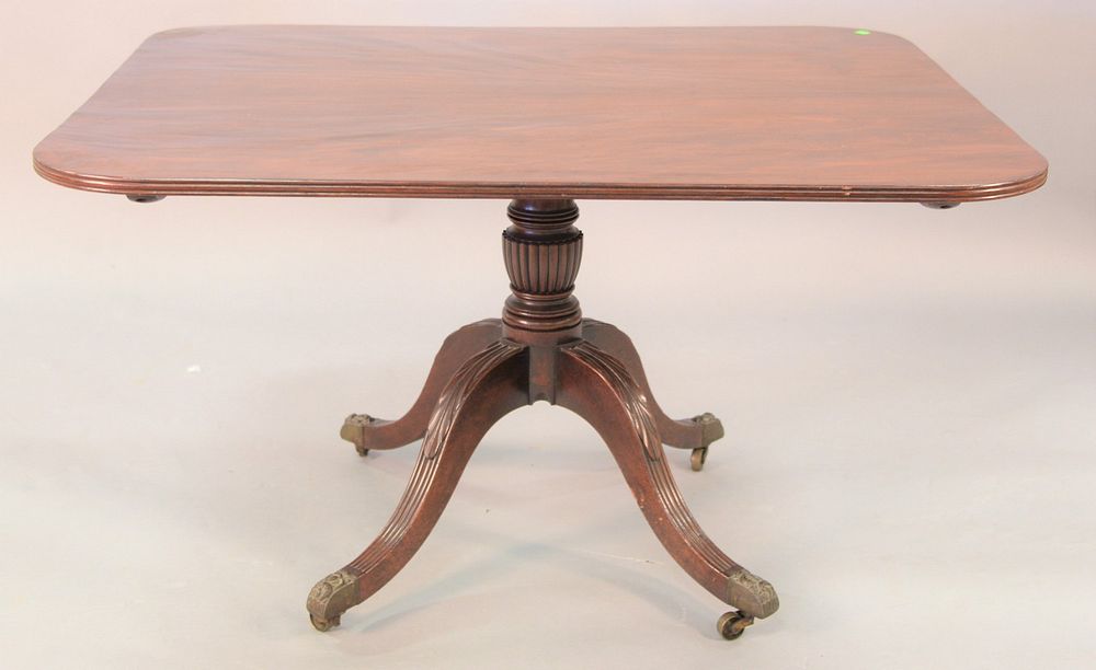 Appraisal: Georgian mahogany breakfast tip table having single board top on