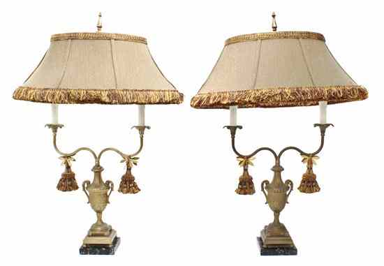 Appraisal: A Pair of Brass Two-Light Candelabra having an urn form