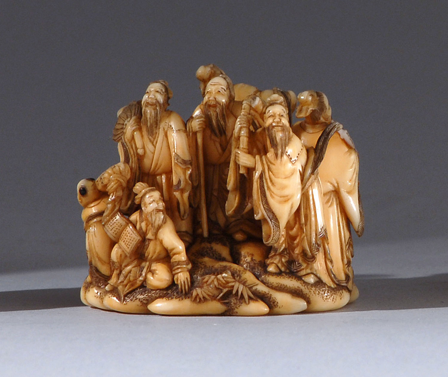 Appraisal: IVORY NETSUKE th CenturyBy Kaigyokusai Masatsugu Depicting seven sages with