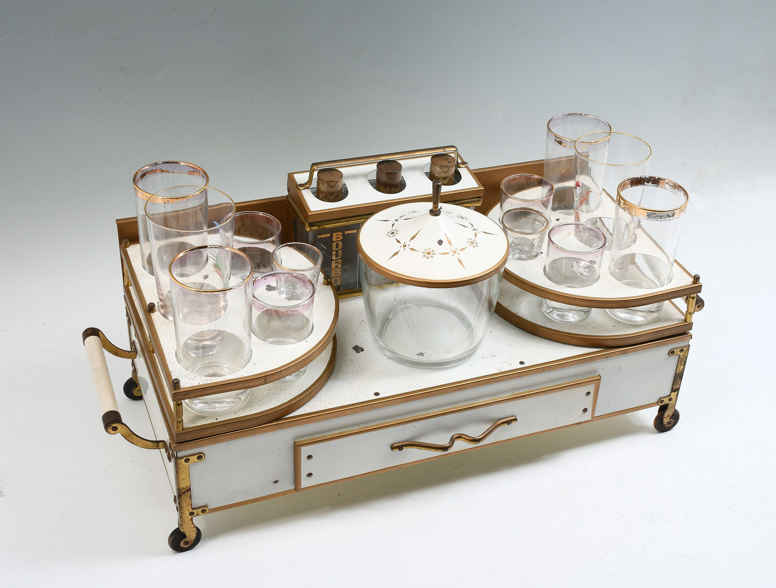 Appraisal: MID-CENTURY ITALIAN REGENCY PORTABLE BAR CADDY Decorative and functional featuring