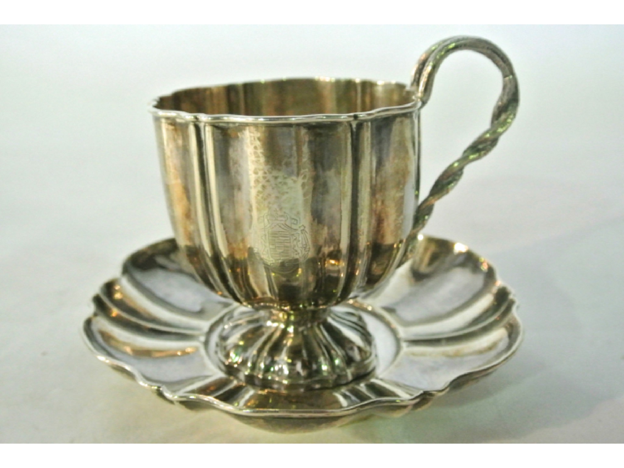 Appraisal: A French silver cup and saucer Francois Diosne Paris -