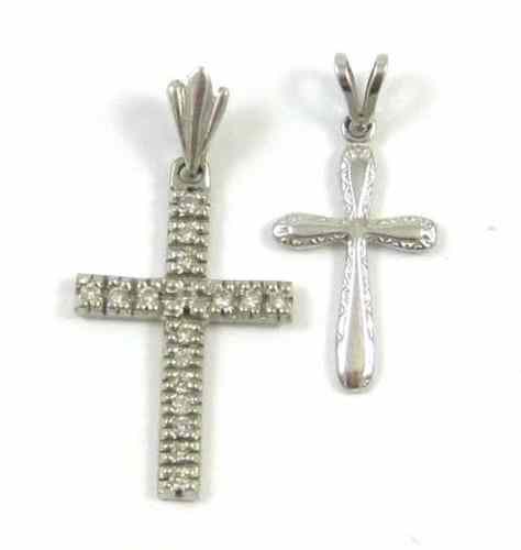 Appraisal: TWO FOURTEEN KARAT GOLD PENDANTS both white gold cross pendants