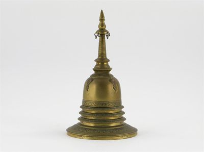 Appraisal: A Sri Lankan brass stupa the body with three concentric