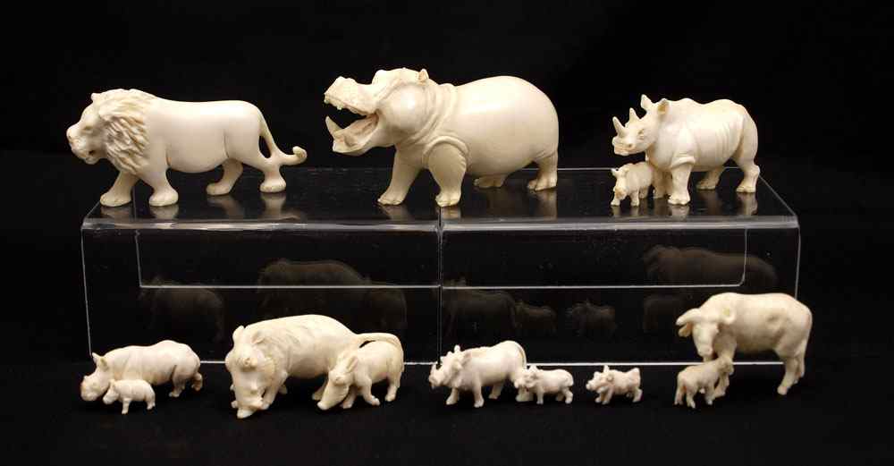 Appraisal: CARVED IVORY AFRICAN ANIMAL MENAGERIE GROUP To include Lion ''