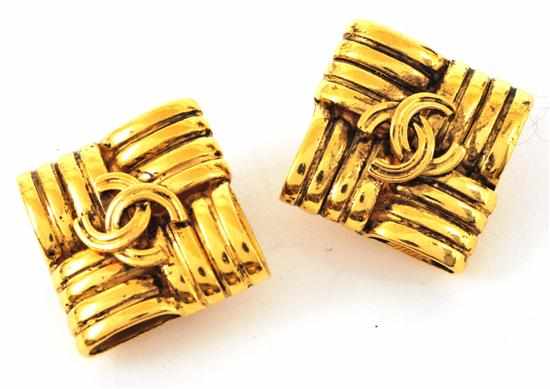 Appraisal: A PAIR OF EARRINGS BY CHANEL The quilted design with