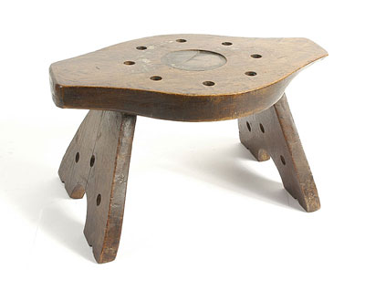 Appraisal: Wooden stool Made from the centre section of a wooden