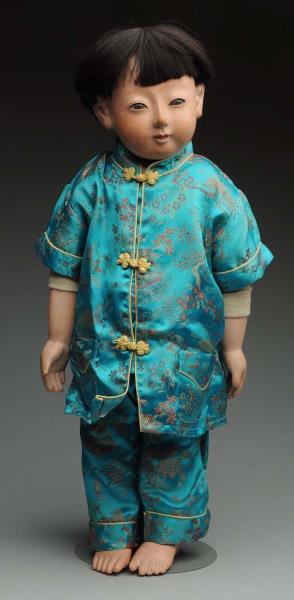 Appraisal: Amazing Oriental Baby Doll Japanese papier-m ch head shoulder plate