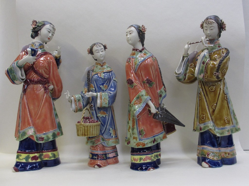 Appraisal: Four Chinese figure of young ladies