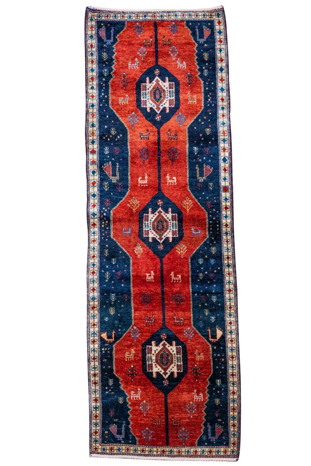 Appraisal: RED BLUE WOOL RUNNERwith a narrow beige border ' x