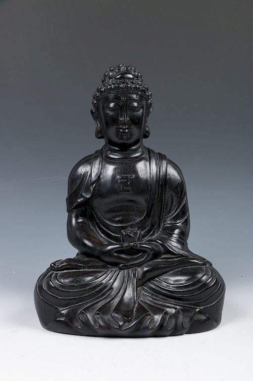 Appraisal: ROSEWOOD BUDDHA FIGURE Depicted seated in dhyanasana hands held in