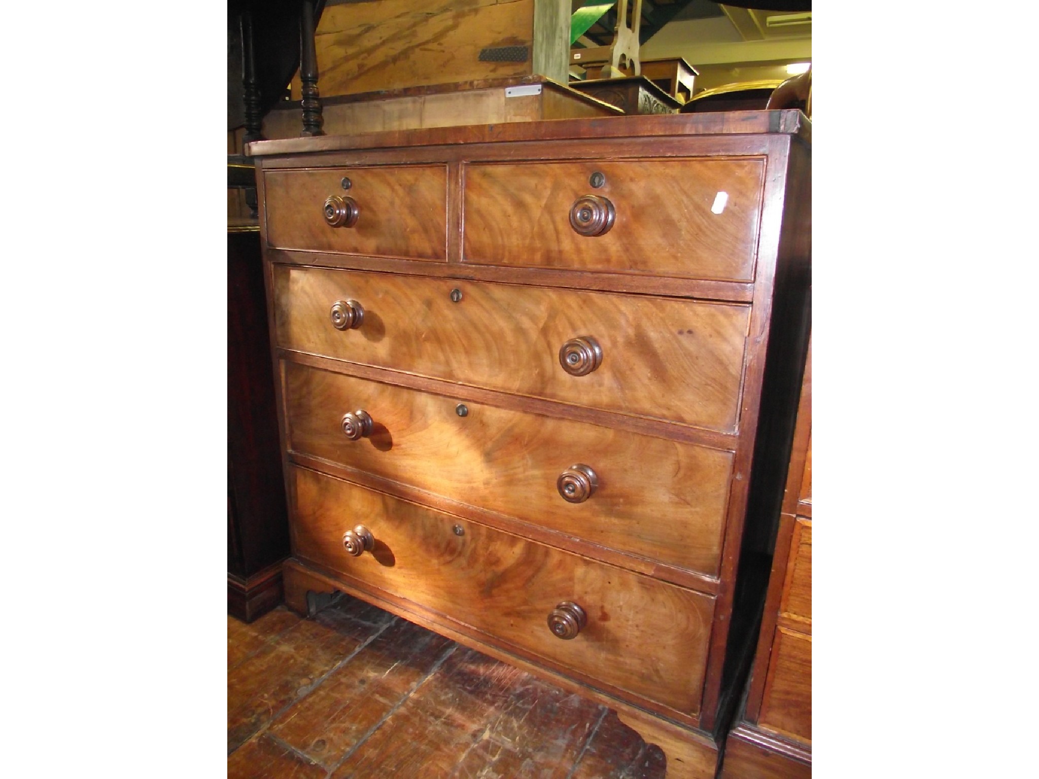 Appraisal: A mid Victorian mahogany chest of three long and two