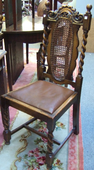 Appraisal: A set of six oak dining chairs of Jacobean design