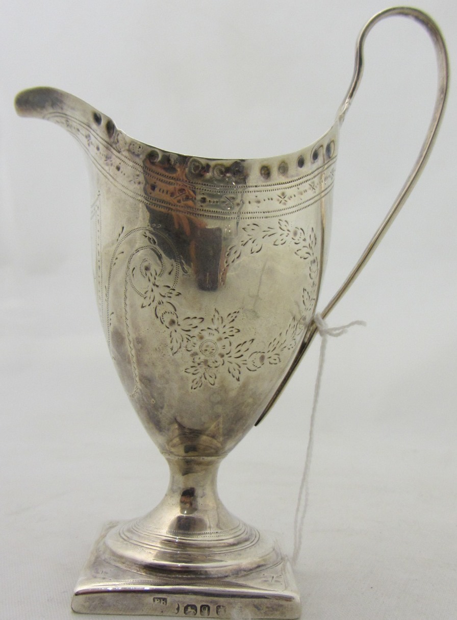 Appraisal: A George III silver cream jug of helmet form engraved