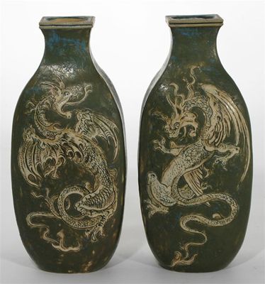 Appraisal: A pair of Martin Brothers stoneware dragon vases slab form