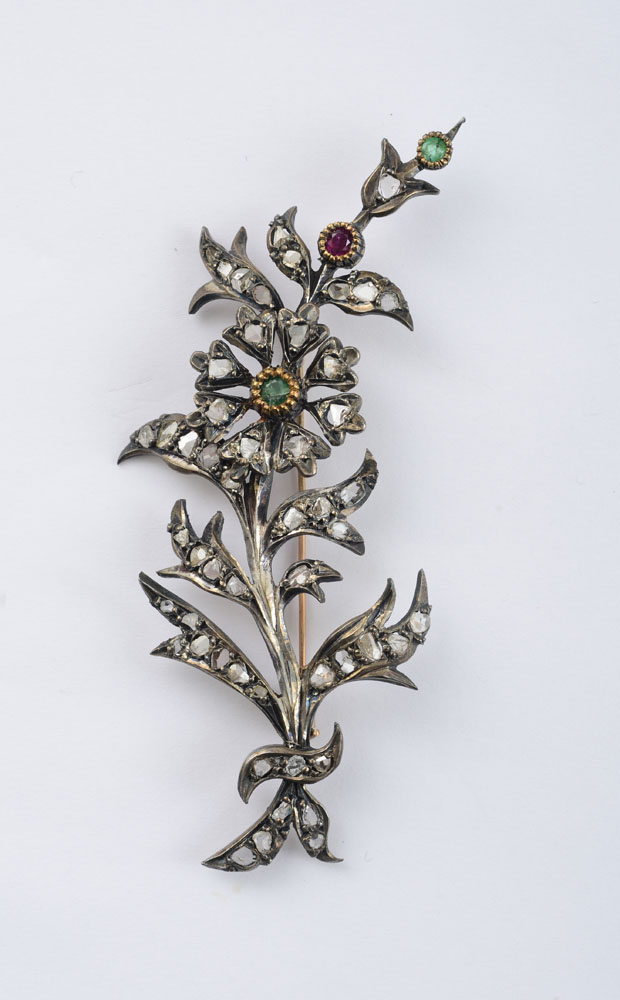 Appraisal: SILVER GOLD AND ROSE DIAMOND FLOWER PIN With rose-cut and