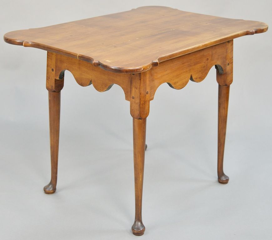 Appraisal: Queen Anne tea table having porringer top set on scalloped