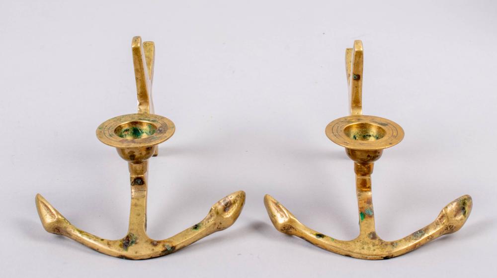 Appraisal: PAIR OF BRASS ANCHOR CANDLE HOLDERS TH CENTURY the candle