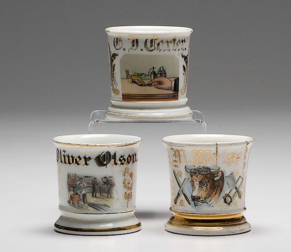 Appraisal: THREE OCCUPATIONAL SHAVING MUGS BUTCHER TINSMITH AND TELEGRAPH OPERATOR porcelain