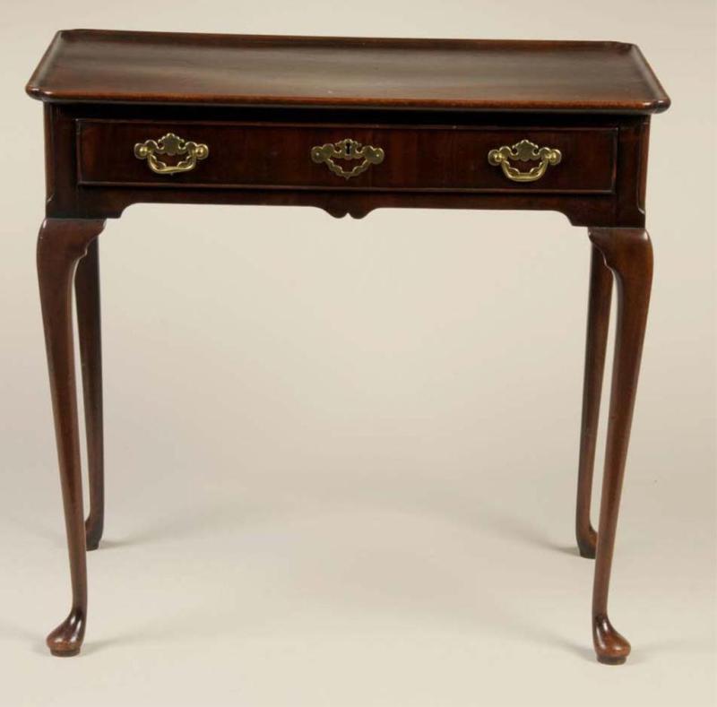 Appraisal: Irish Queen Anne Mahogany Tray-Top Tea Table Description Circa Molded