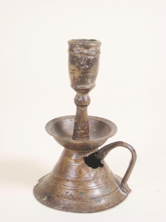 Appraisal: A very early bronze Chamber Candlestick with side handle wide