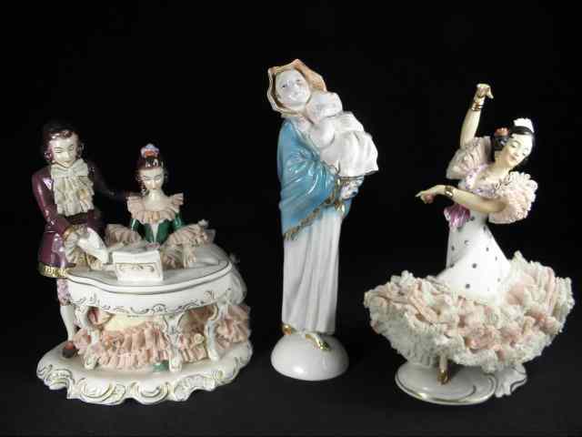 Appraisal: Two Dresden porcelain figurines along with an Italian ''Madonna and