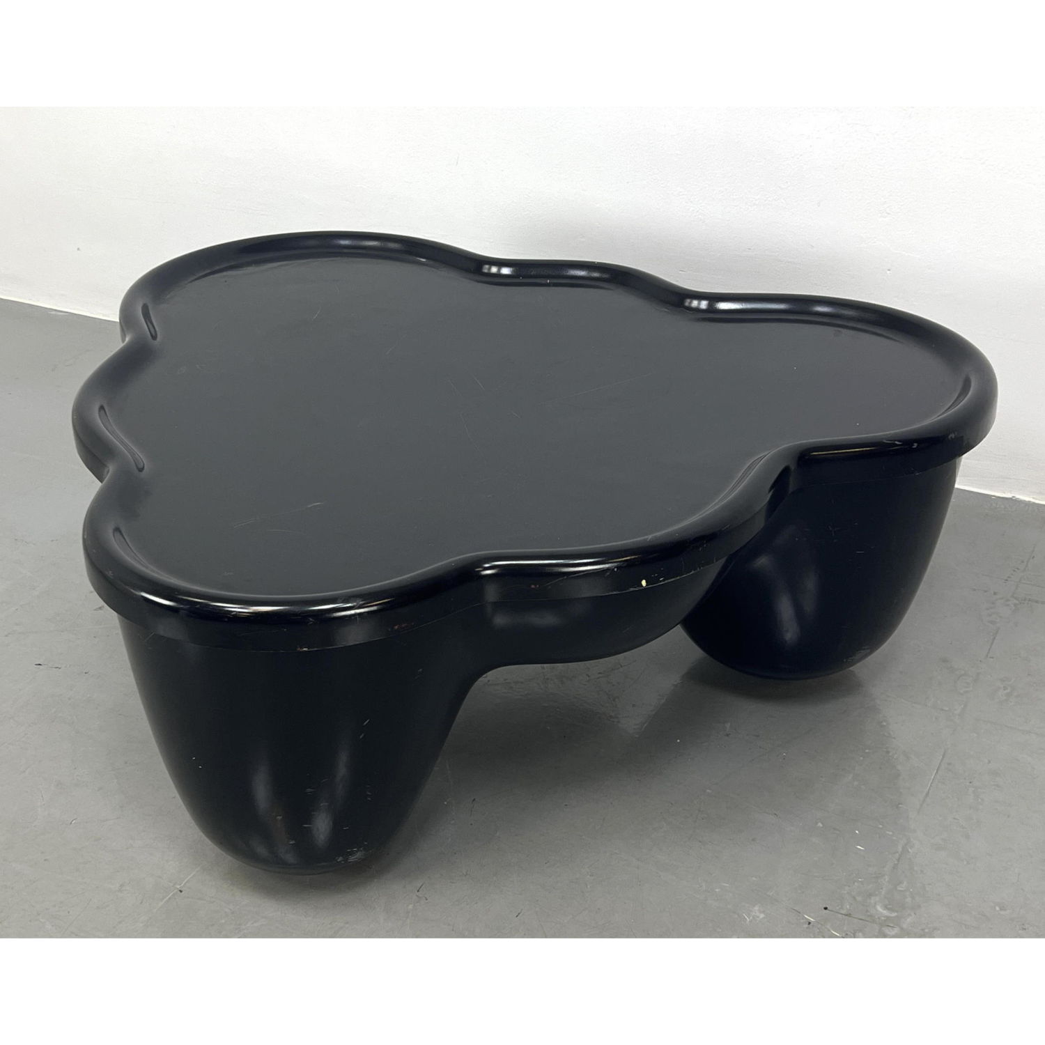 Appraisal: Rare WENDELL CASTLE Molar Coffee Table Black Coated fiberglass form